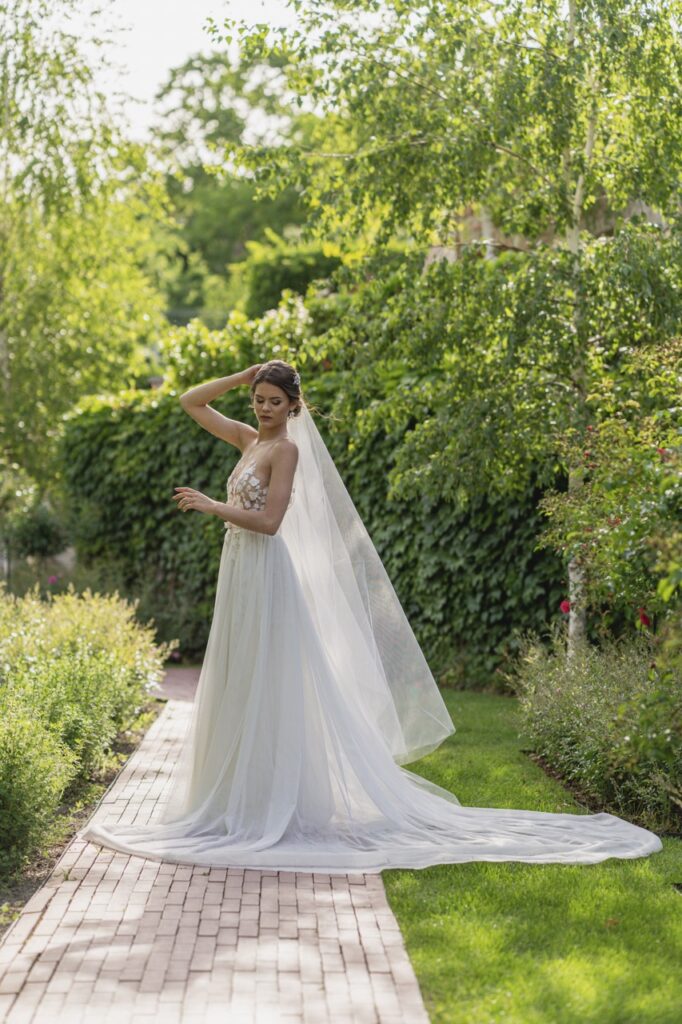 petevelvet_wedding_234 Kiss among garden blooms London wedding photographer