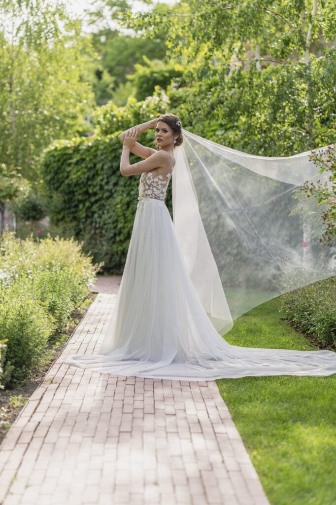 petevelvet_wedding_239 Groom lifting bride in garden London wedding photographer